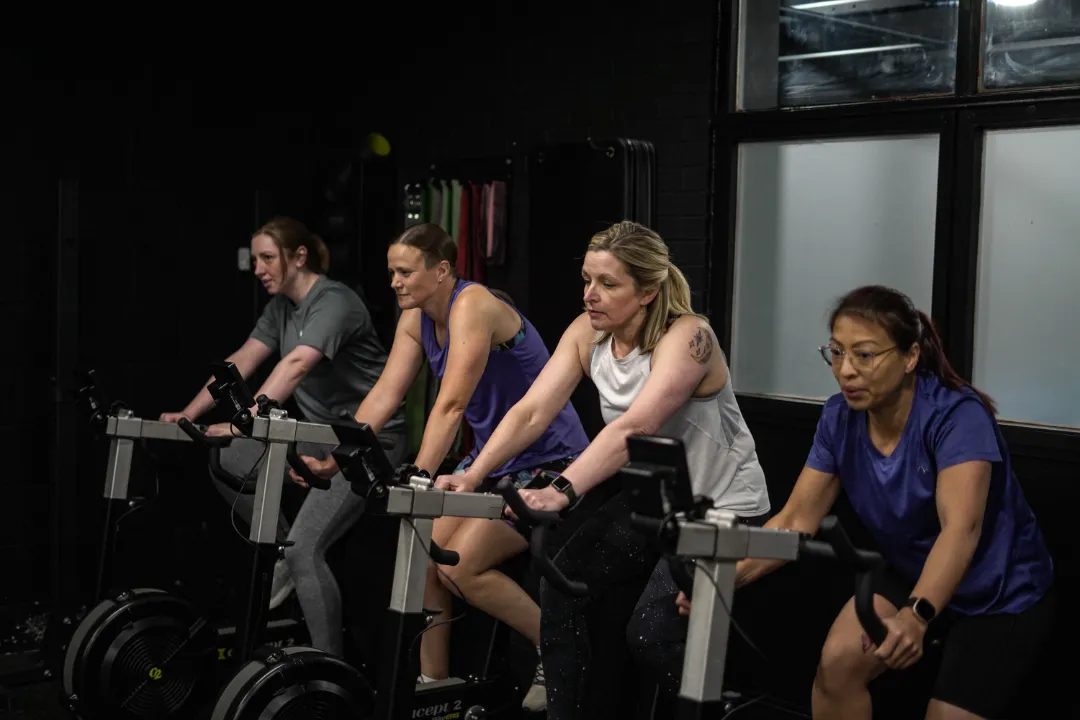 Primal members on a row of air bikes